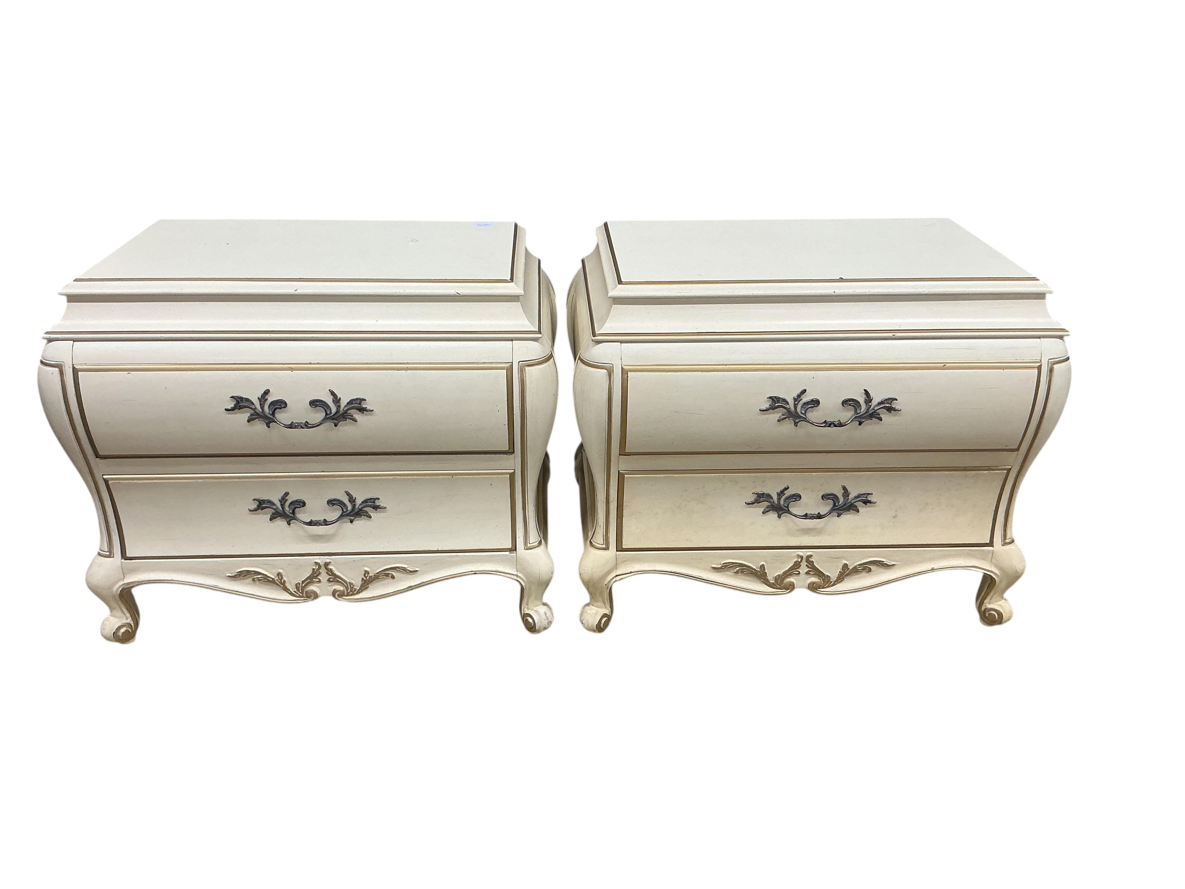 A pair of American cream and gilt painted bedside chests, width 80cm, depth 47cm, height 68cm